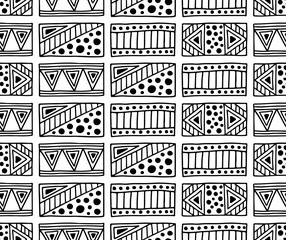 Seamless vector pattern. Black and white geometrical background with hand drawn decorative tribal elements. Print with ethnic, folk, traditional motifs. Graphic vector illustration.