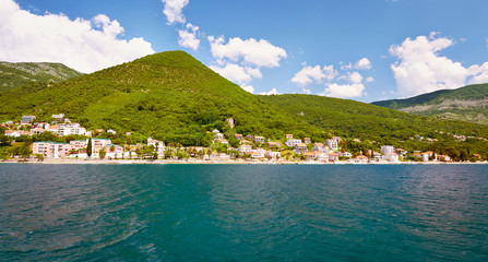 Picturesque sea view of Boka Kotorska, Montenegro, Herzeg Novi old town fortress. Shoot wide angle, sunset