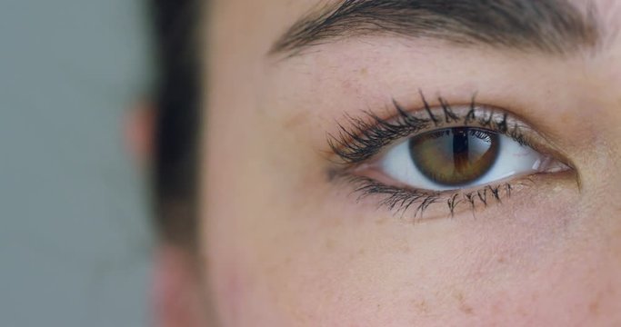 perfect woman  brown eye macro in a sterile environment