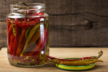 Marinated hot peppers in jar