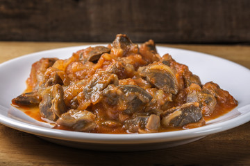 Chicken gizzard stew on plate