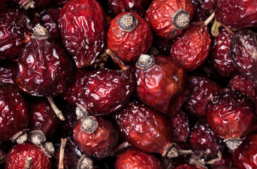 Close-up horizontal photo of dried berry dogrose (rose-hip) background. Healthy food and agriculture concept