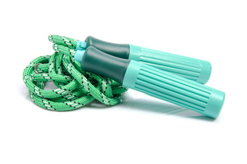 Green skipping rope for an exercise, isolated on white background