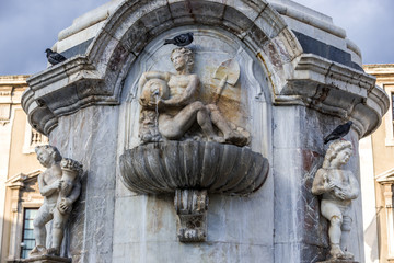 Close upn on base of Elephant Fountain from 18th century on Cathedral Square in Catania, Sicily, Italy