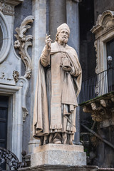 Fototapeta na wymiar Statue in front of Catania Cathedral in Catania on the island of Sicily, Italy