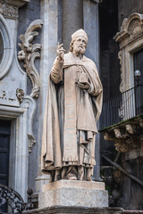 Statue in front of Catania Cathedral in Catania on the island of Sicily, Italy