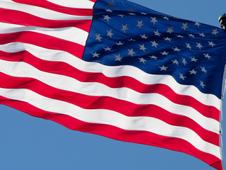 American Flag Waving with Blue Sky