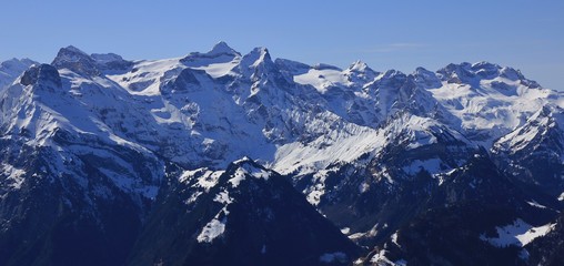 Fototapeta na wymiar Uri Rotstock and other mountains seen from mount Fronalpstock, Switzerland.