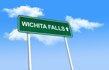 Road sign - Wichita Falls. Green road sign (signpost) on blue sky background. (3D-Illustration)
