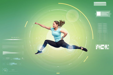 happy sporty young woman jumping in fighting pose
