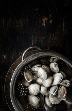 Clamshells in colander