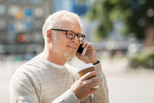 happy senior man calling on smartphone in city