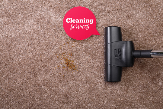 Vacuuming carpet with vacuum cleaner. Cleaning services speech bubble. Dirt on the rug. Housework service. Close up of the head of a sweeper cleaning device.