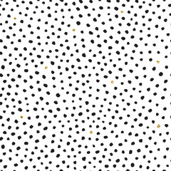 Black and gold hand drawn vector seamless dot pattern.