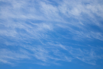 Fantastic soft white clouds against blue sky