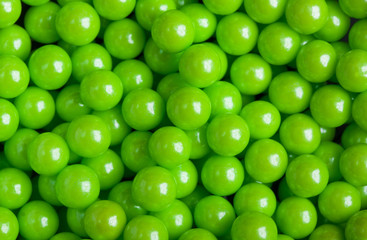 Green candy pattern, gummy ball candies for background