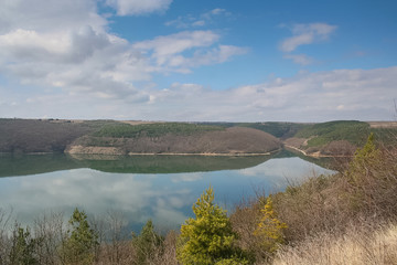 Field pebble agglomerates on the banks of the Dniester river near the urban-type settlement of Stara Ushytsya in Kamenetz-Podolsk district of Khmelnitsky region of Ukraine. March 2007