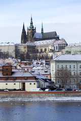 Snowy freeze Prague Lesser Town with gothic Castle, Czech republic
