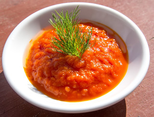 Tomato sauce on a white plate