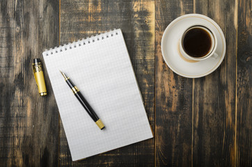 Fountain pen on a wooden table