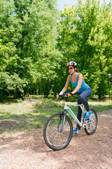 Fototapeta na wymiar Recreational cycling through the forest