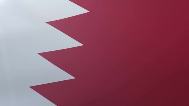 Flag of Bahrain waving on flagpole in the wind, national symbol of freedom
