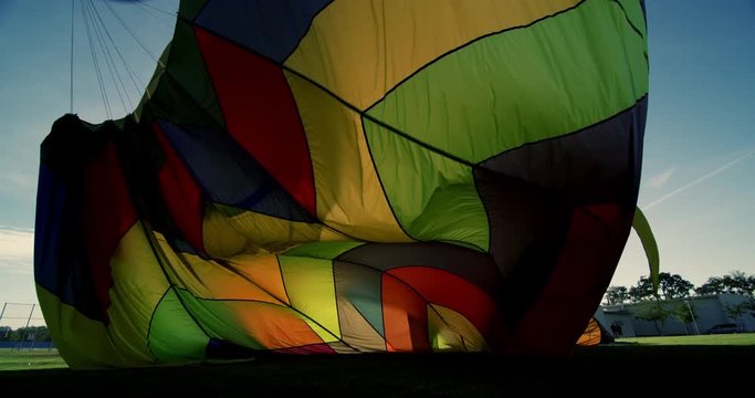 Low angle, hot air balloon deflates