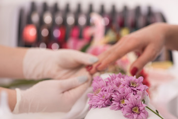 Woman hands receiving a manicure