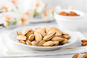 Almond nuts on white background