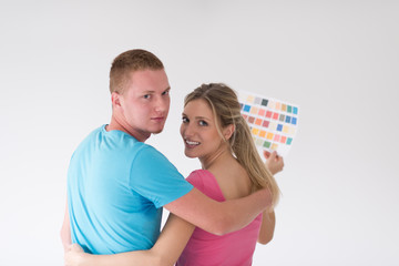 couple looking at color samples at home