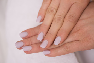 woman fingers with french manicure