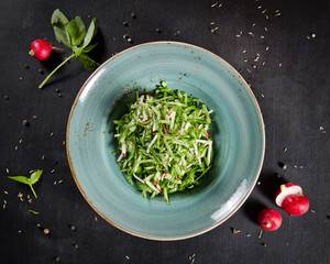 Fresh salad of cucumber, radish, Chinese cabbage.