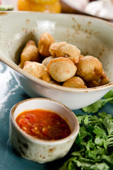 Chuchvara. Fried dumplings with lamb and spicy sauce. Traditional dish of cuisine in Central Asia