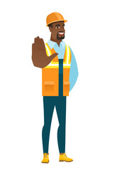 African-american builder showing palm hand.
