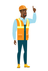 Builder with open mouth pointing finger up.