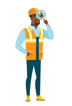 African-american builder with magnifying glass.