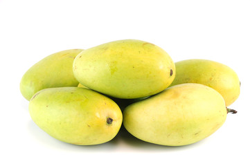 close up on fresh mangoes background