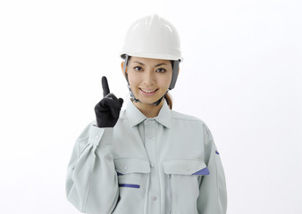 Construction worker pointing with her finger