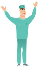 Surgeon standing with raised arms up.