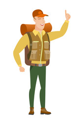 African traveler pointing with his forefinger.