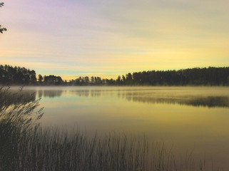Morning fog on the lake, sunrise shot