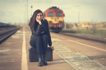 Cute woman at the train station