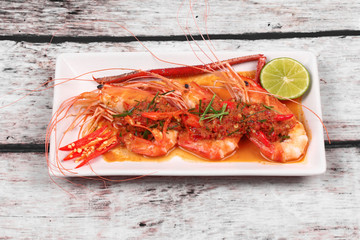 Large prawn topped spicy coconut cream curry.