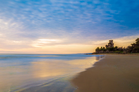 Pineto (Abruzzo, Italy) - The sunrise on the Adriatic sea, from the Pineto beach, beside the Torre di Cerrano castle