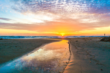 Pineto (Abruzzo, Italy) - The sunrise on the Adriatic sea, from the Pineto beach, beside the Torre di Cerrano castle