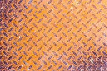 Surfaces metal floor sheet with rust.