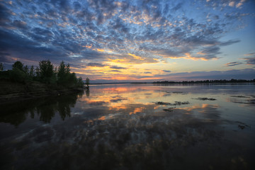 Obraz premium sunset over the river