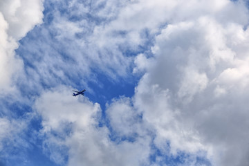 Plane among the clouds