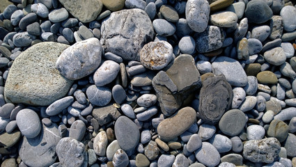 Pebbles on the sea shore. Horizontal view