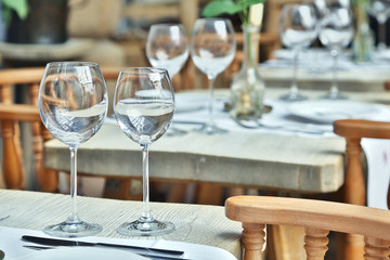 Table setting with wine glasses at the vintage cafe.